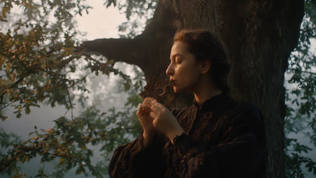 A woman whispering through a piece of bark